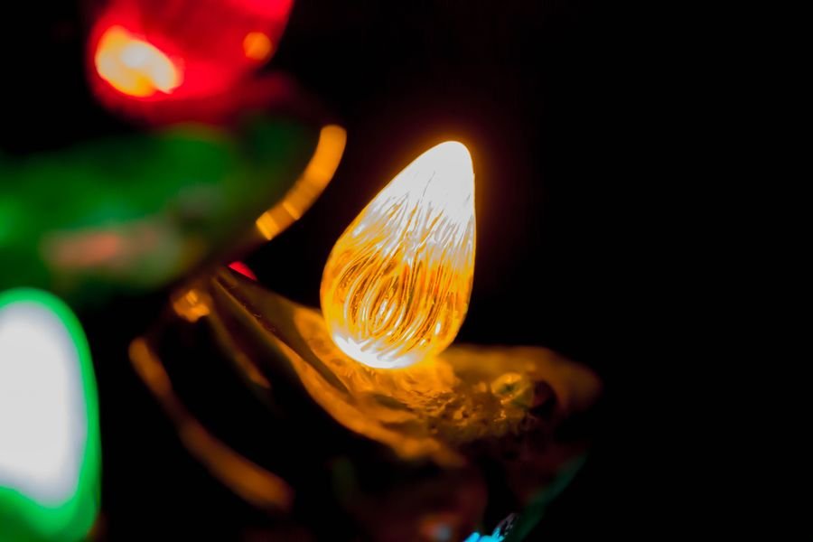Close-up of a glowing C9 Christmas bulb